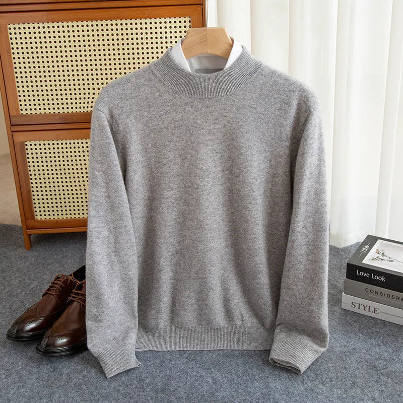 Men's half-collar wool sweater in a loose fit, shown in a choice of colours including black, brown, camel, and grey.