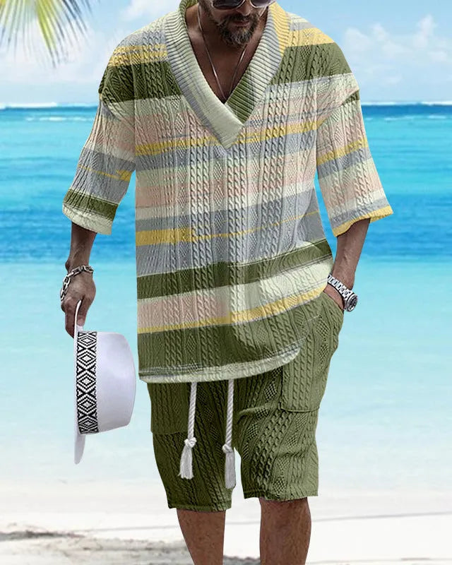 Man wearing a loose fit casual short sleeve top and matching shorts suit set
