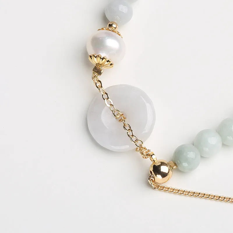 Women's jade pearl bracelet with natural emerald peace buckle and geometric national style design