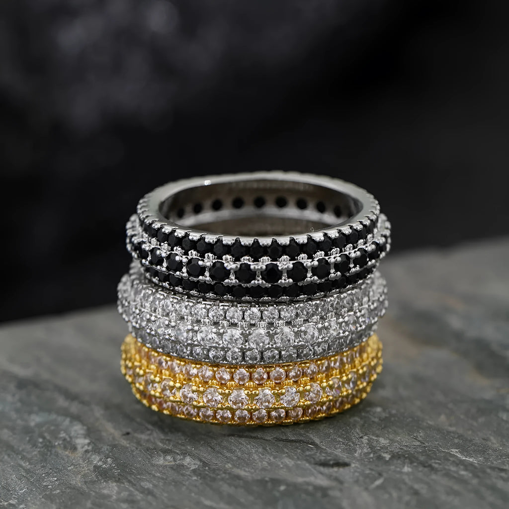 Geometric triangular copper ring with inlaid zircon stones in a choice of three metal finishes.