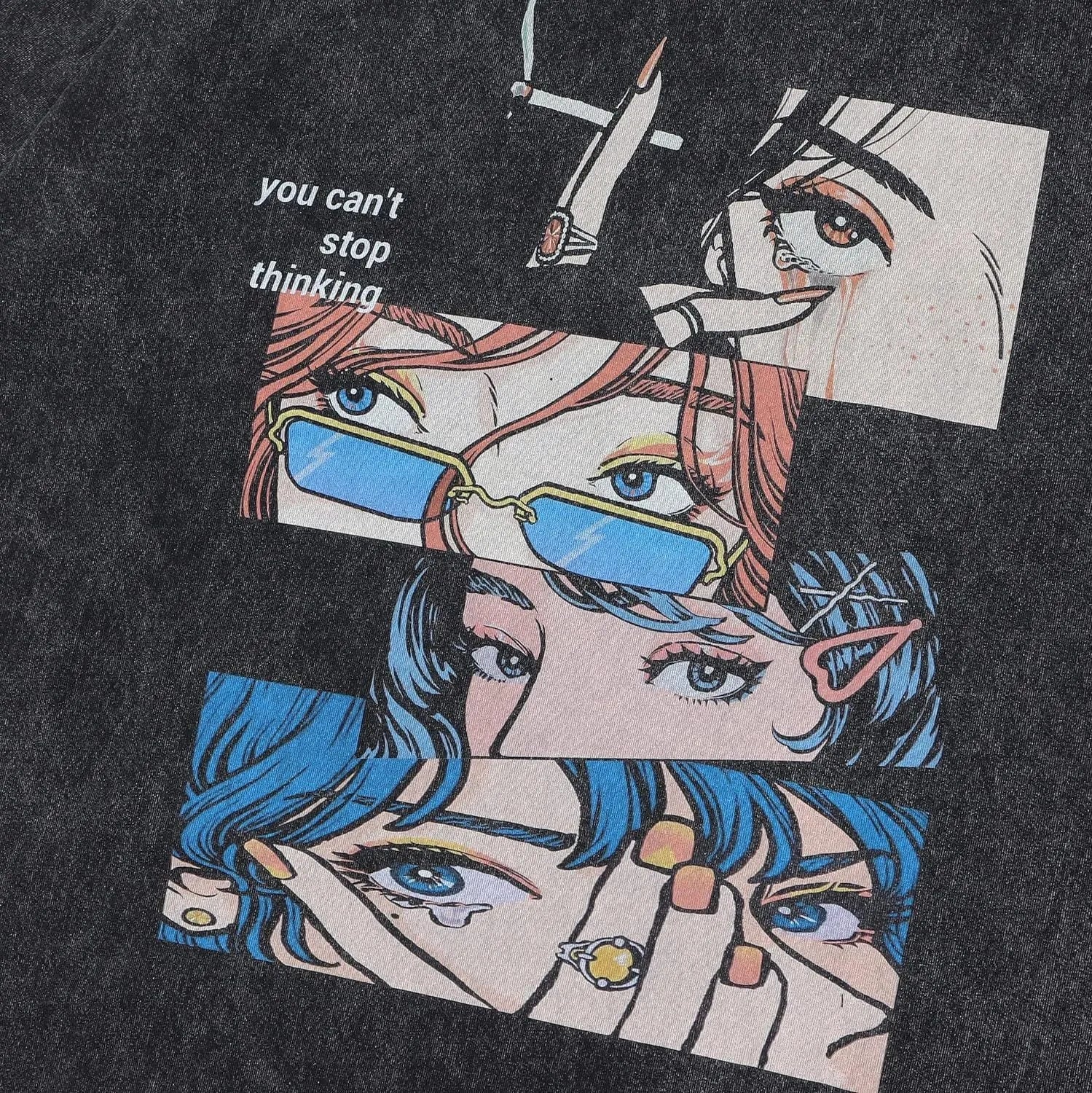 Men's washed black cotton t-shirt with a cartoon print, featuring short sleeves and a loose fit.