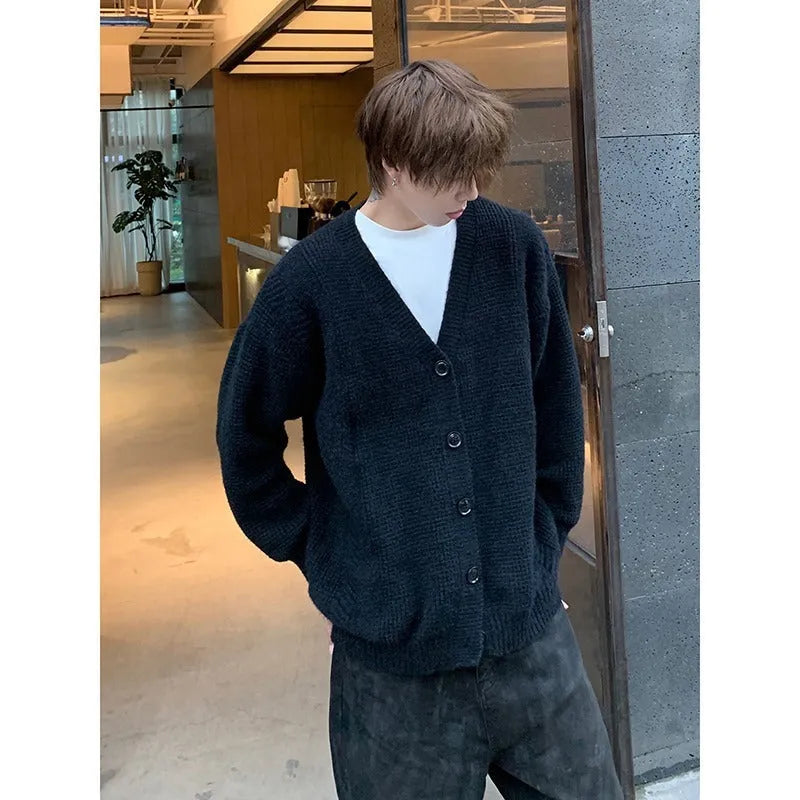Men's solid colour V-neck knit cardigan in a loose fit, shown in army green.