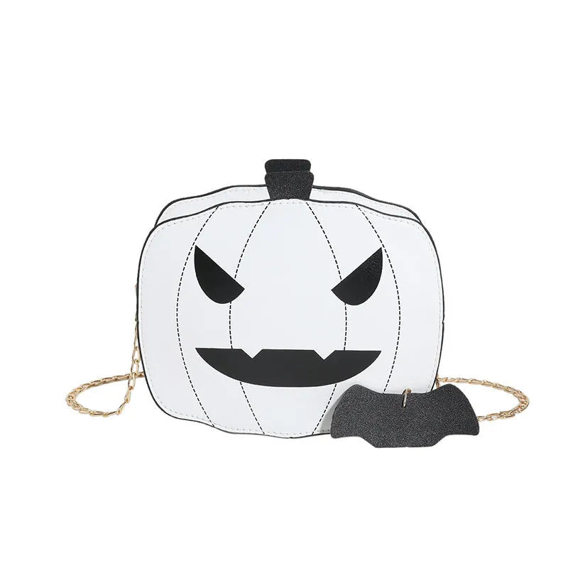 Cartoon pumpkin shoulder bag in orange with chain strap on white background