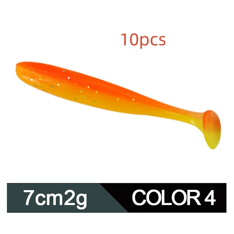 Soft plastic T-tail fishing lure in two-tone mandarin fish pattern, 7cm long.