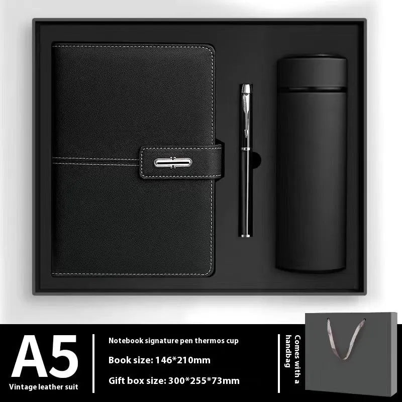 Custom A5 notebook with imitation leather cover in Business Black showing wood-free paper interior pages