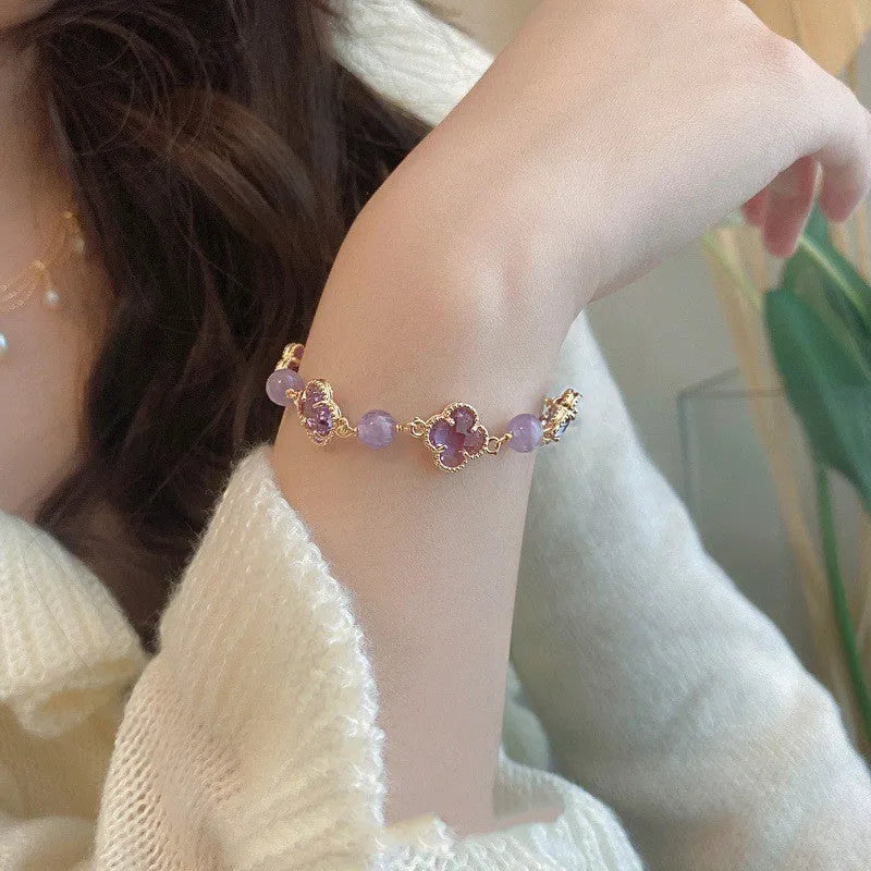 Artificial amethyst bracelet for women with U-shaped design, pearl accents, and four-leaf clover motif