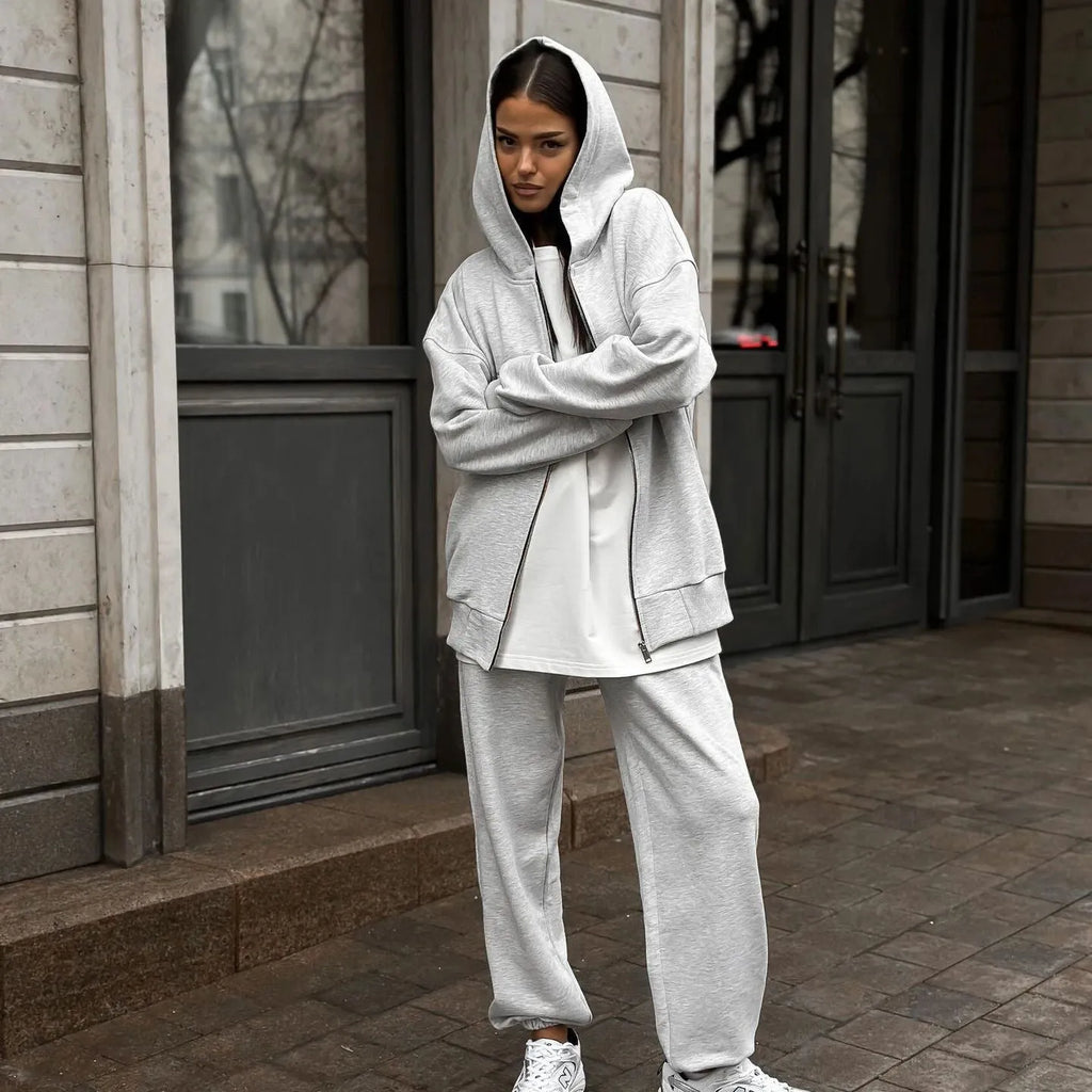 Street style two-piece set featuring long-sleeved coat and matching trousers in loose fit