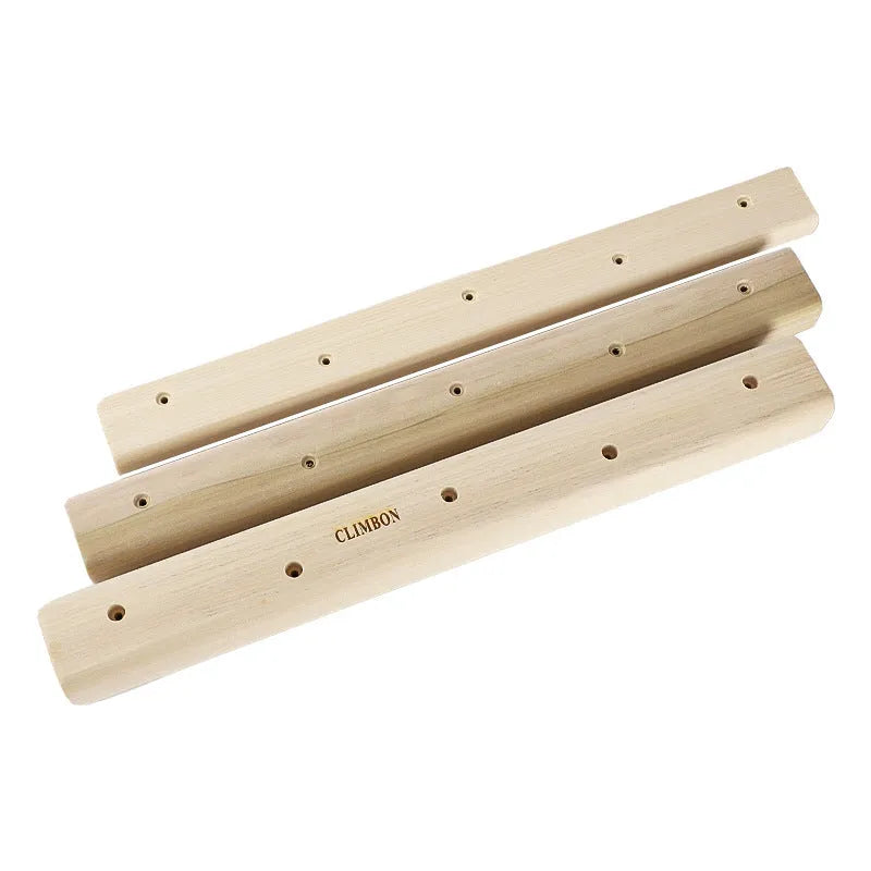 Three solid wooden fingerboards of different lengths for grip and climbing strength training.