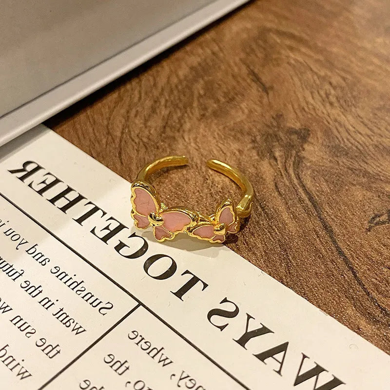 Chinese butterfly design women's ring in polished copper with oil drip texture