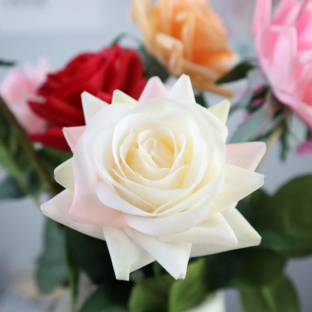 Silk fabric artificial rose bouquet in assorted colours with realistic petals, approximately 42cm long