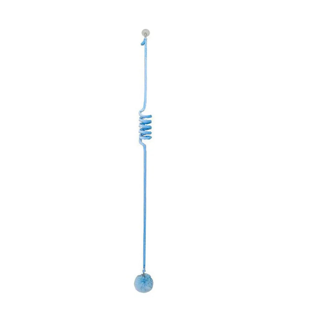 Hanging cat toy with bell stick and red inflatable ball attached to a glass door by a suction cup.