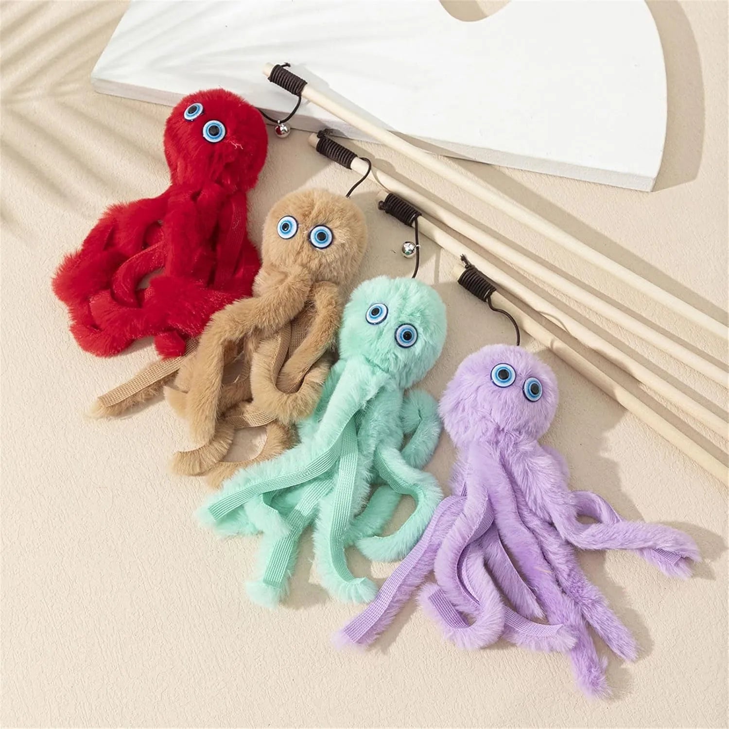 Furry octopus cat toy with eyes on 40cm long stick in pink colour for kitten play