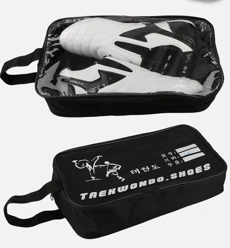 Black and white children's martial arts training shoes with a soft sole and widened design.