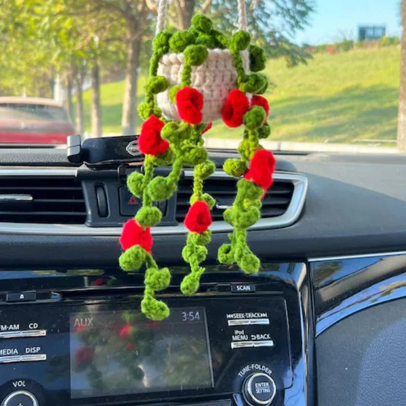 Green and white knitted rope car plant ornament with 8cm base and hanging rope.