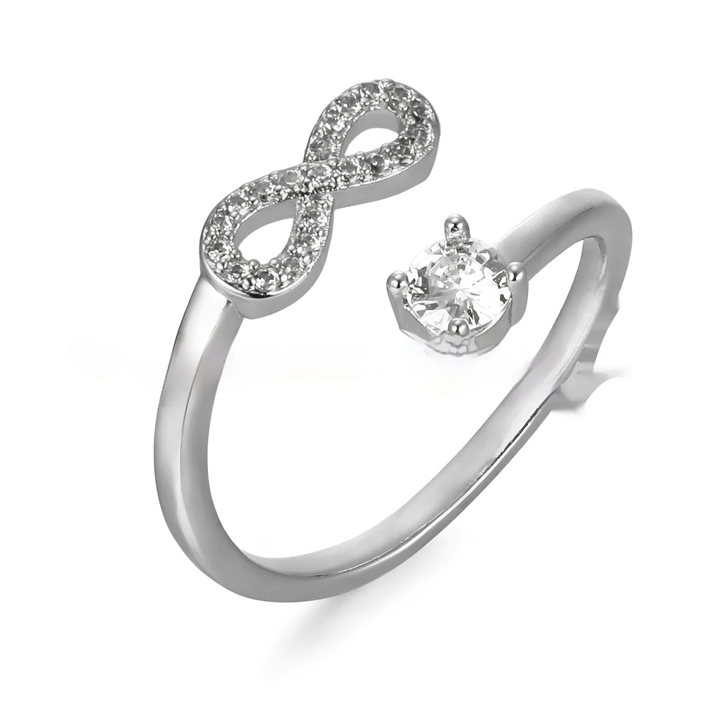 Geometric open zircon letter ring showing metal construction with inlaid gems in gold rose gold or silver finish