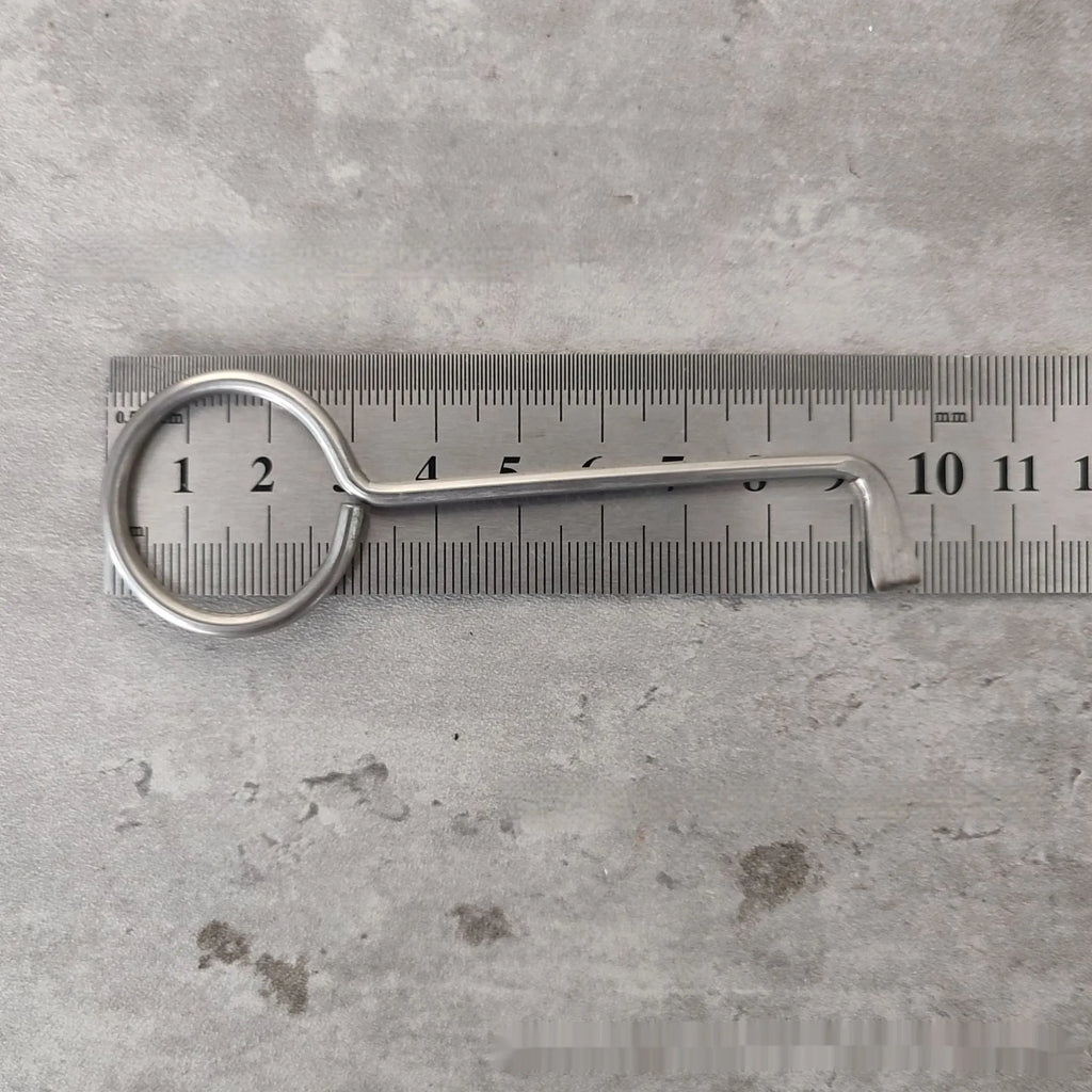 Two identical silver alloy steel wrench tools from a portable household repair set.