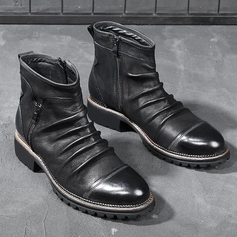 Black and brown cowboy-style Martin boots with a side zipper and round toe.