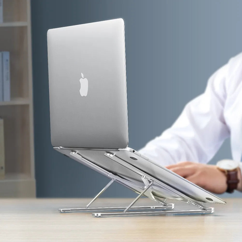 Foldable aluminum laptop stand in silver colour, shown both open in use and folded flat.