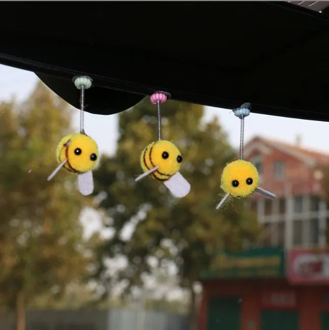 Soft fur ball bee car decoration measuring 3x3 centimetres with cartoon design