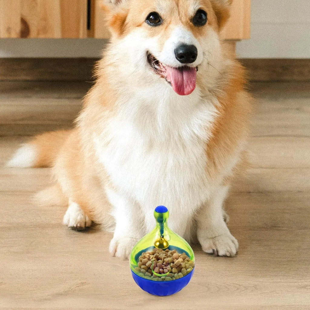 Blue tumbler-shaped interactive treat dispenser ball for dogs and cats on floor