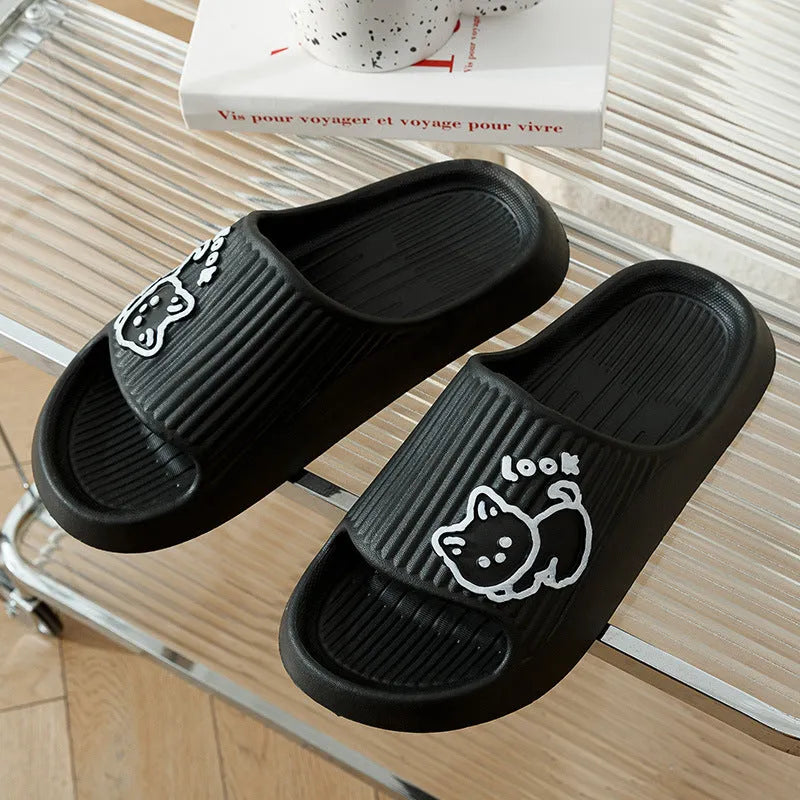 Women's green cat slippers with thick EVA platform sole, shown from above.