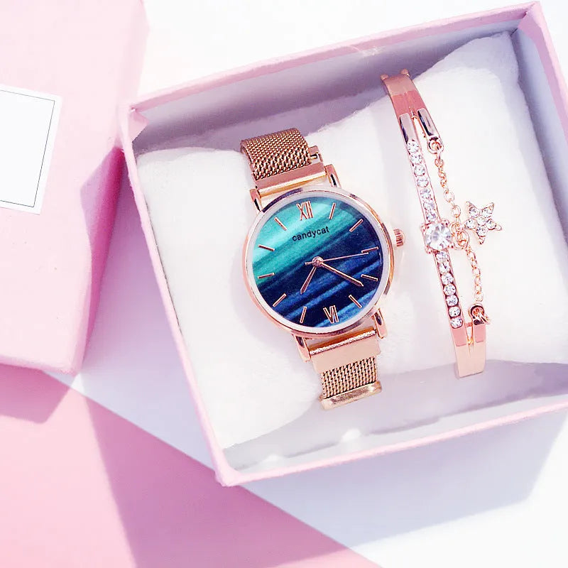 Women's retro marble watch with 32mm round dial, alloy strap, and titanium case back on white background