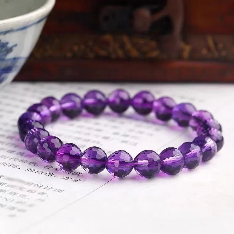 Handcrafted 128-facet cut crystal bracelet in amethyst, ametrine, or citrine colour with choice of bead size.