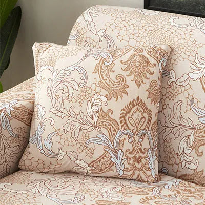 Geometric patterned stretch sofa slipcover fitted on a modern two-seater sofa.