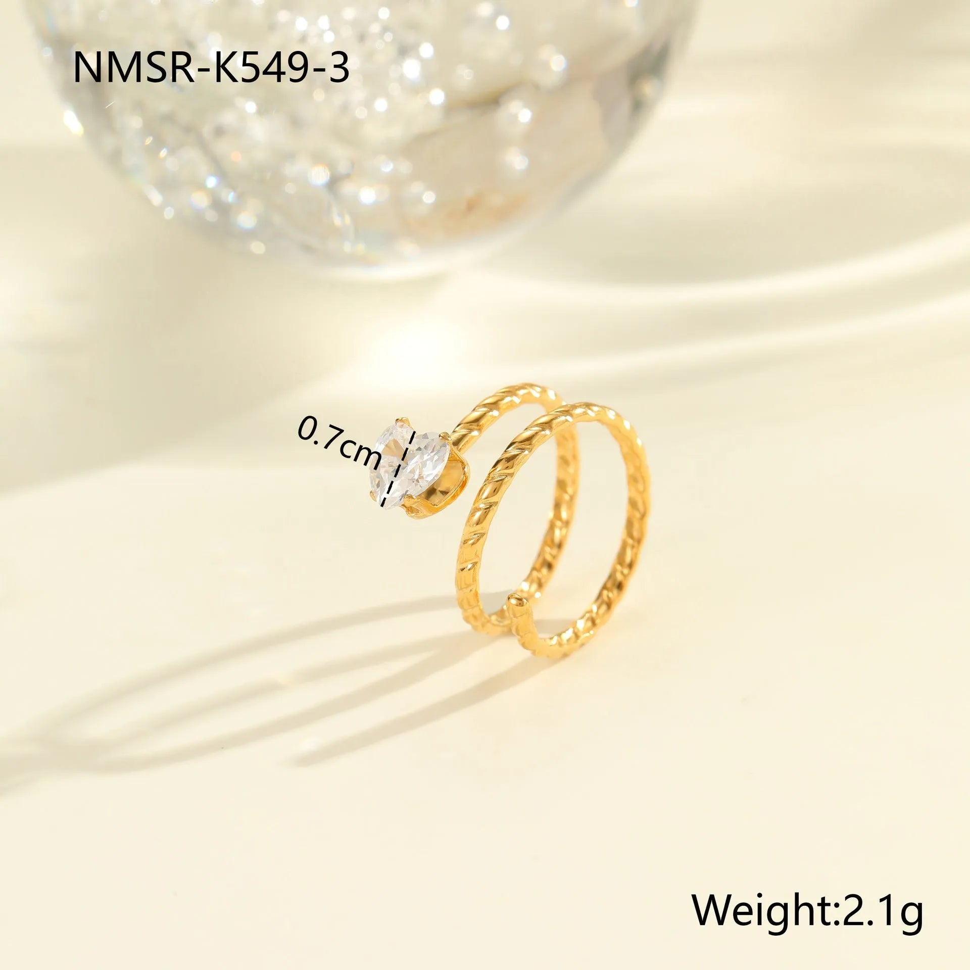 Stainless steel women's ring with gold electroplating and zircon details in geometry design
