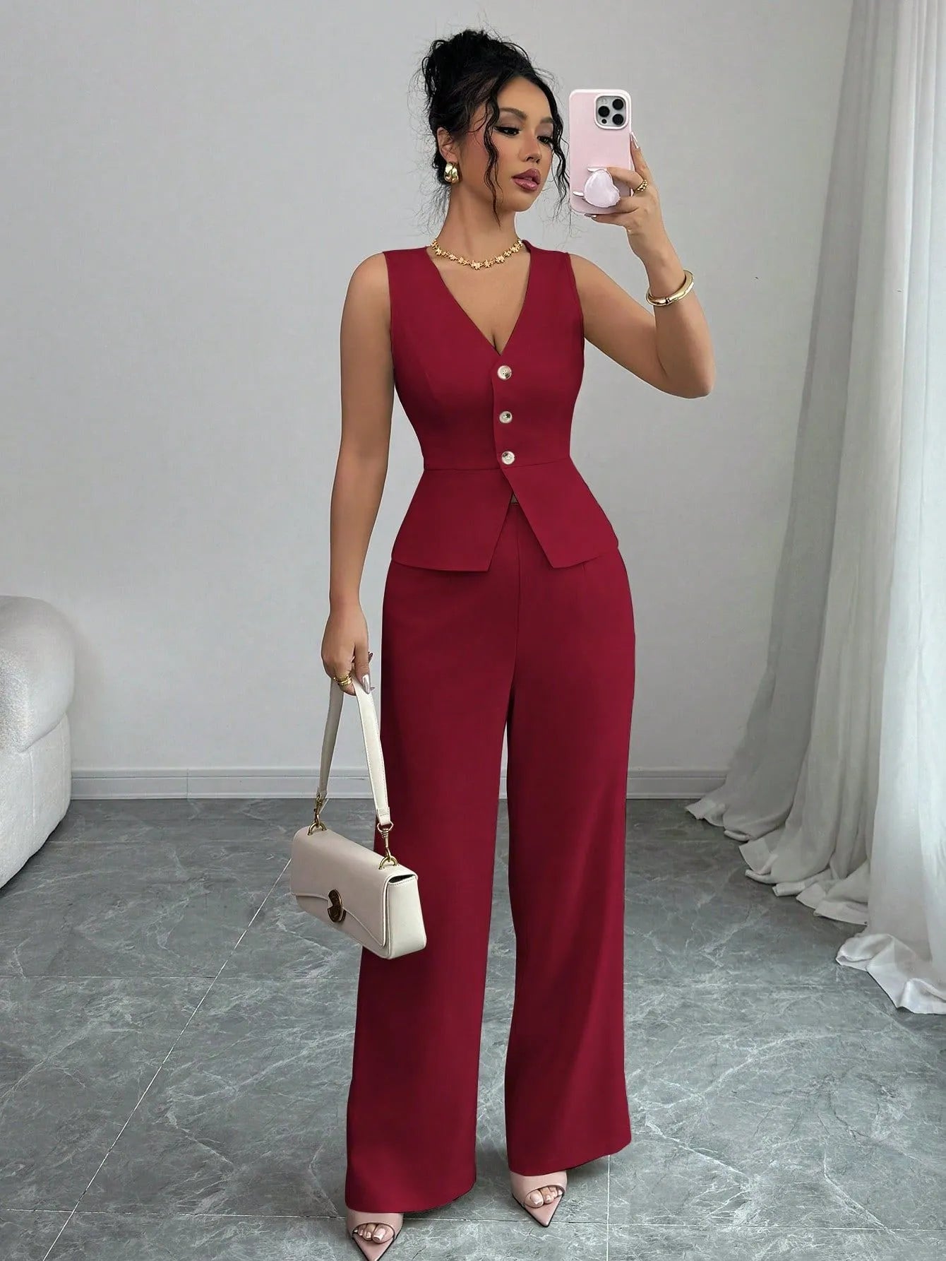 Women's solid colour sleeveless vest and high-waist trouser two-piece set in a casual style.
