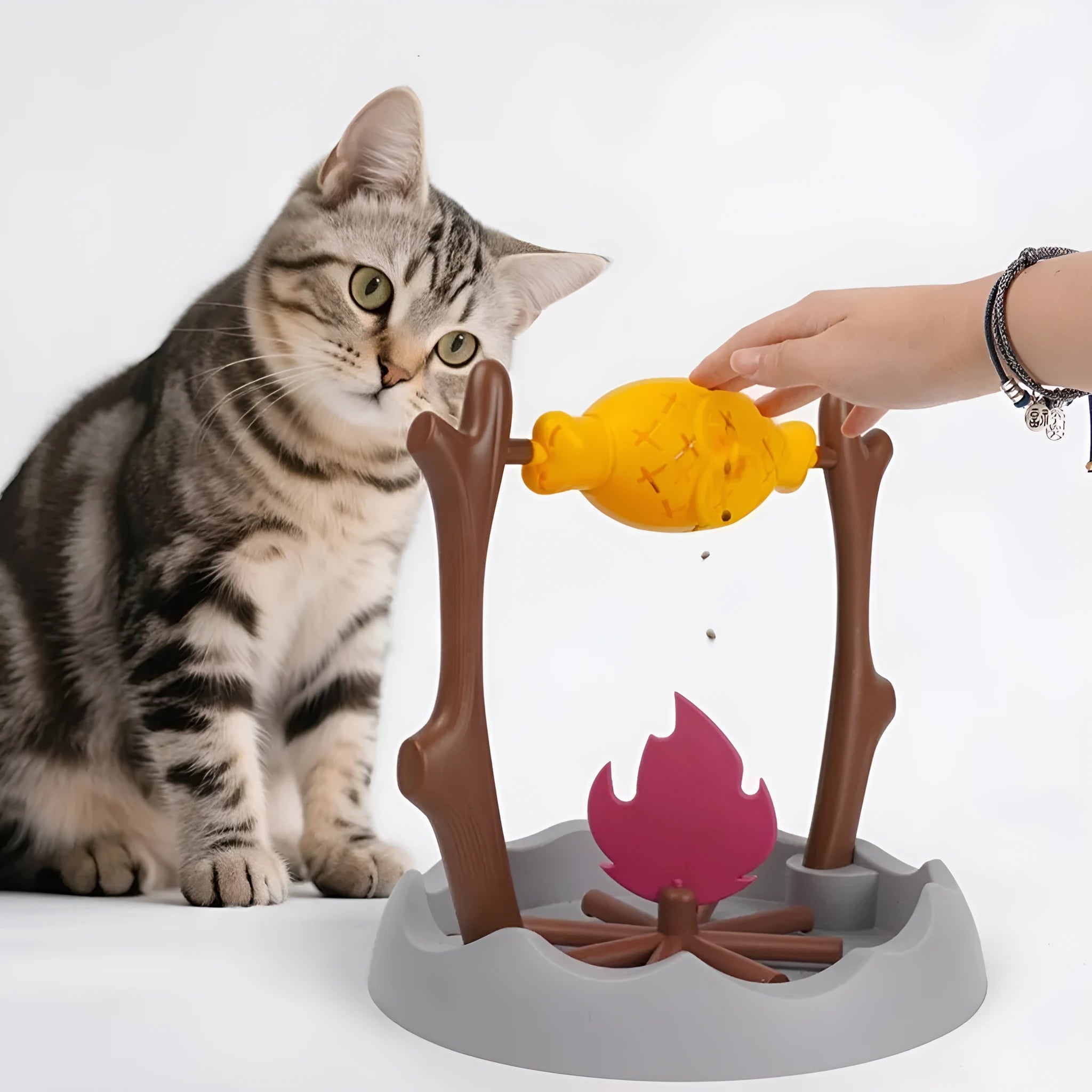Barbecue-shaped tumbling cat feeder toy for interactive food dispensing play