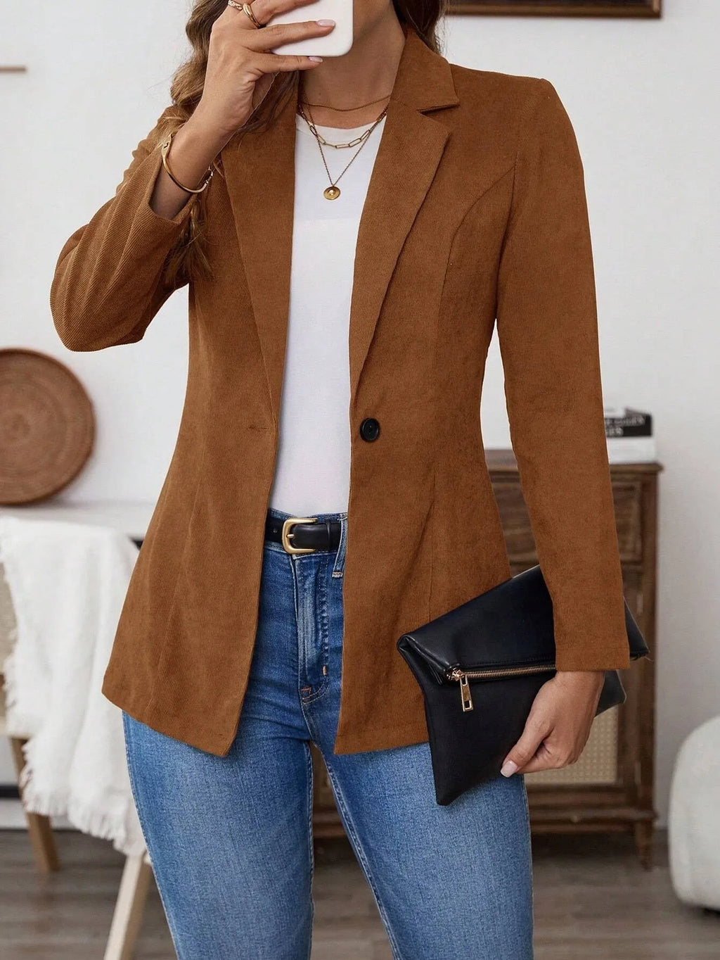 Brown men's casual suit coat with notch lapels, long sleeves, and a single-breasted button fastening.