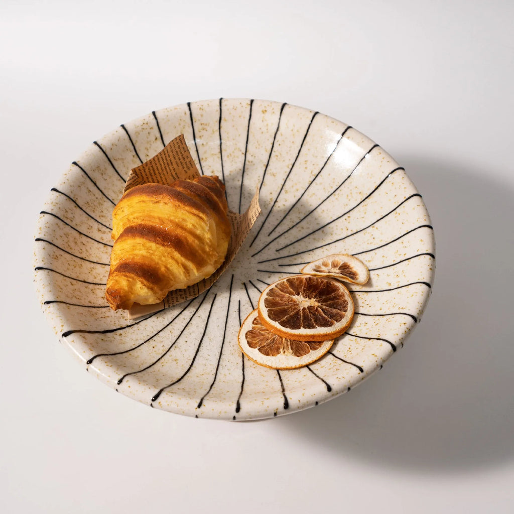 Black and white striped synthetic resin fruit plate for dessert serving