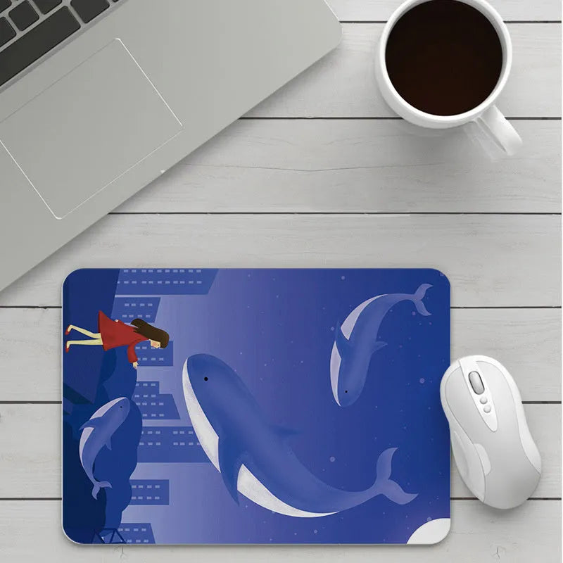 Custom cartoon mouse pad with thickening, showing example artwork on non-slip rubber and cloth base.
