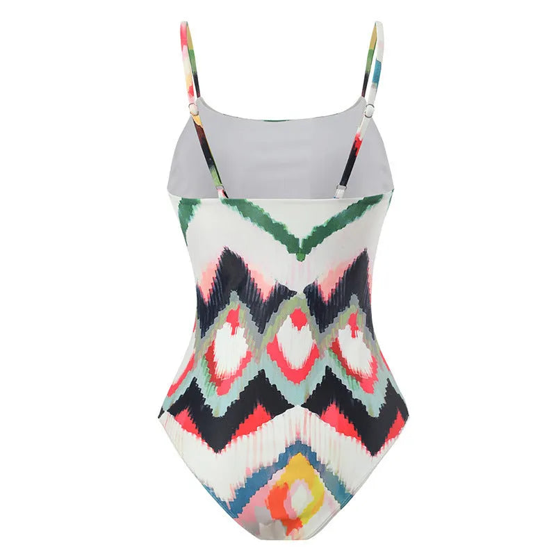 Women's two-piece swimsuit set with striped hip skirt in quick-drying polyester fabric.