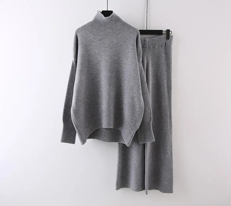 Women's beige acrylic long-sleeve sweater and wide-leg trousers two-piece casual set.