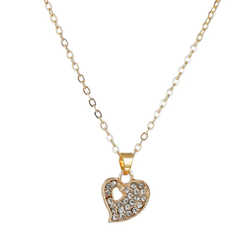 Gold electroplated alloy women's jewellery set with love pendant necklace, earrings and bracelet