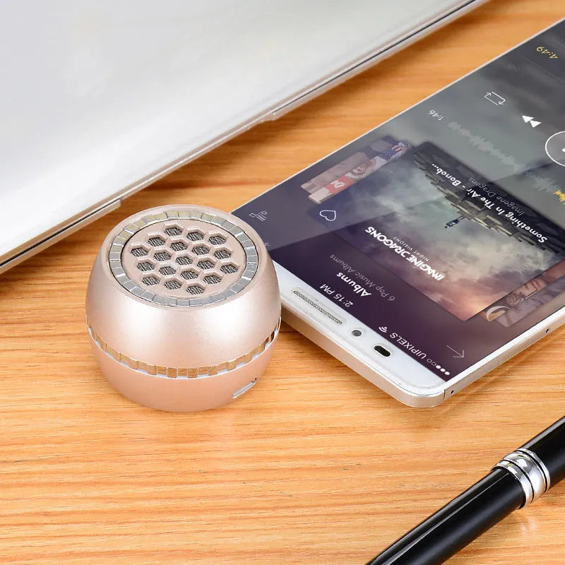 Universal external amplifier speaker in black, gold, and rose gold colours with 5V power input