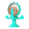 Interactive pet spinner toy in blue, green, red, or yellow with treat holes and suction base.