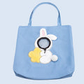 Canvas pet carrier bag with animal patterns and safety zippers in blue colour