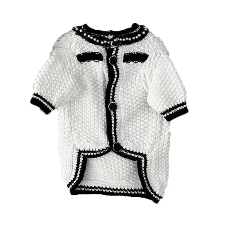 White Korean style dog sweater with pearl collar on small dog, showing princess cut and decorative details