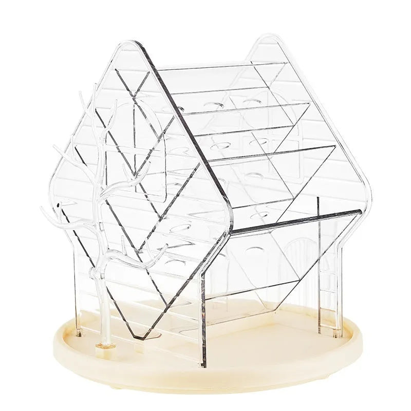 360 degree rotating cosmetics storage organiser box in clear and Amber Gold colours on a table.
