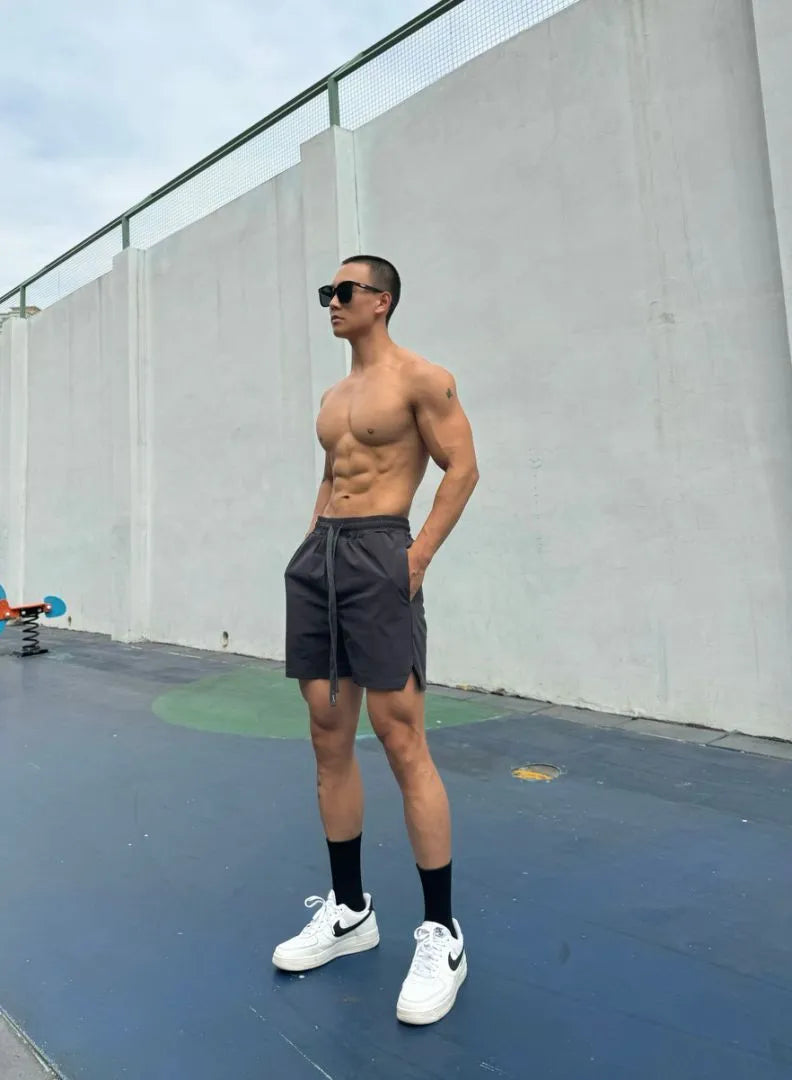 Men's ice silk quick-drying double-layer casual shorts in multiple colours.