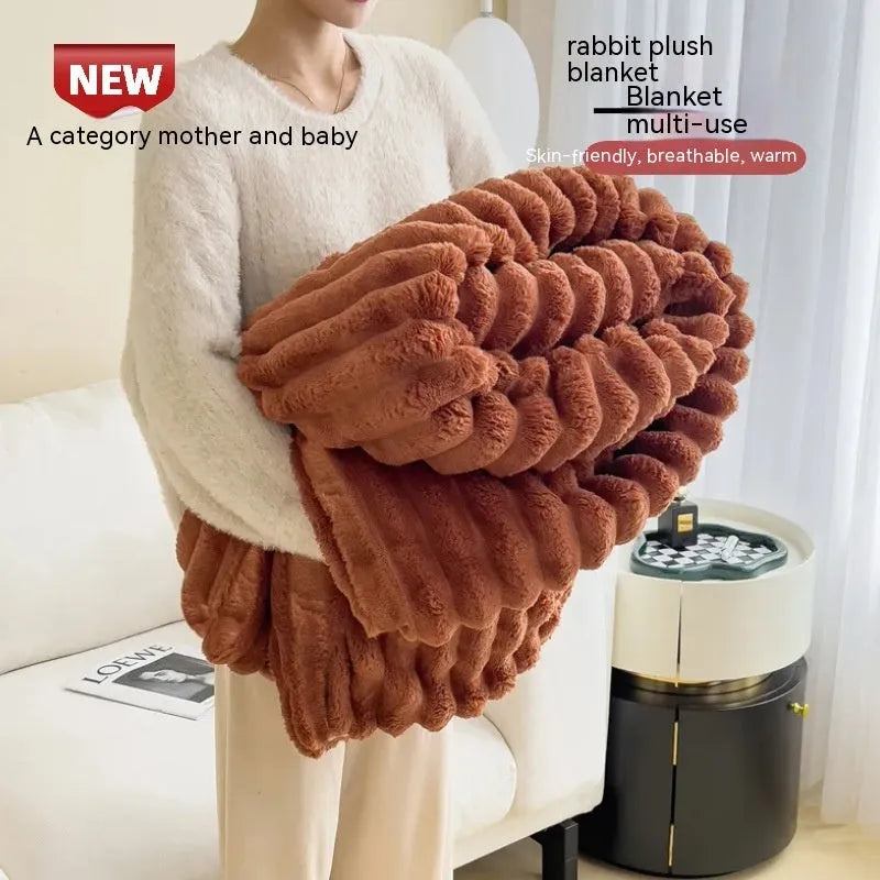 Soft Wind bubble velvet faux rabbit fur blanket in a solid colour, showing its double-sided texture.
