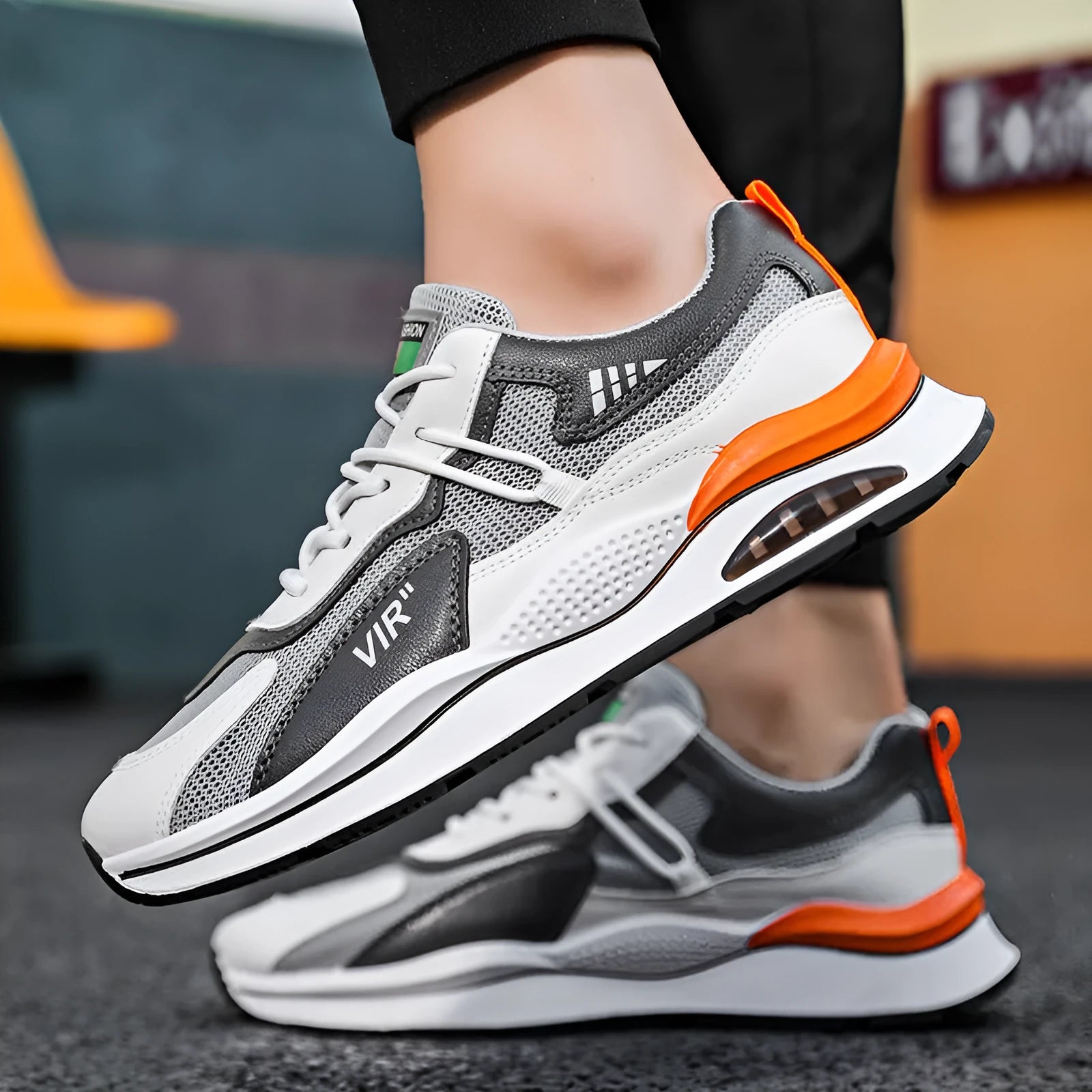 Men's grey breathable mesh casual running shoes with a lightweight EVA sole on a white background.