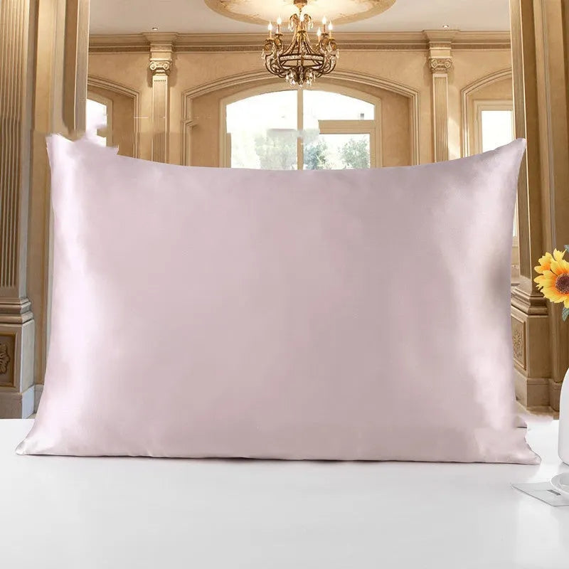 Double-sided 19 M silk pillowcase in apricot colour, showing reversible construction and standard UK size.