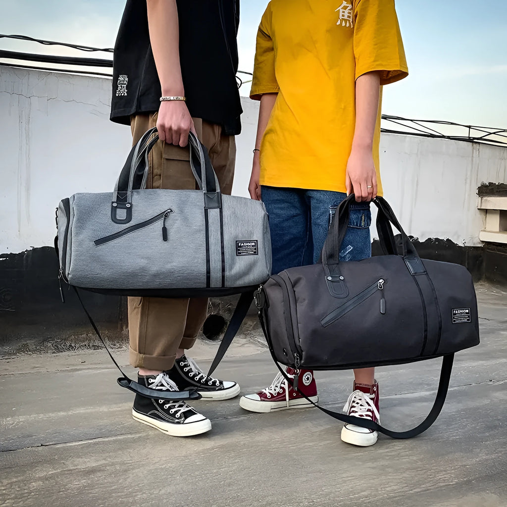 Cylindrical wet and dry sports gym bag in black with polyester texture and zippered pockets