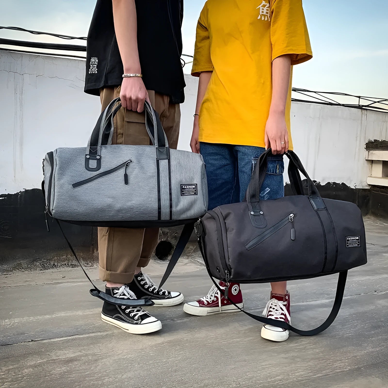 Cylindrical wet and dry sports gym bag in black with polyester texture and zippered pockets