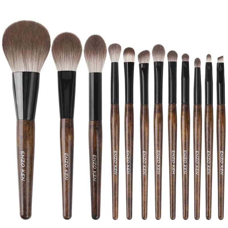 12-piece makeup brush set with wooden handles in grey PU storage case