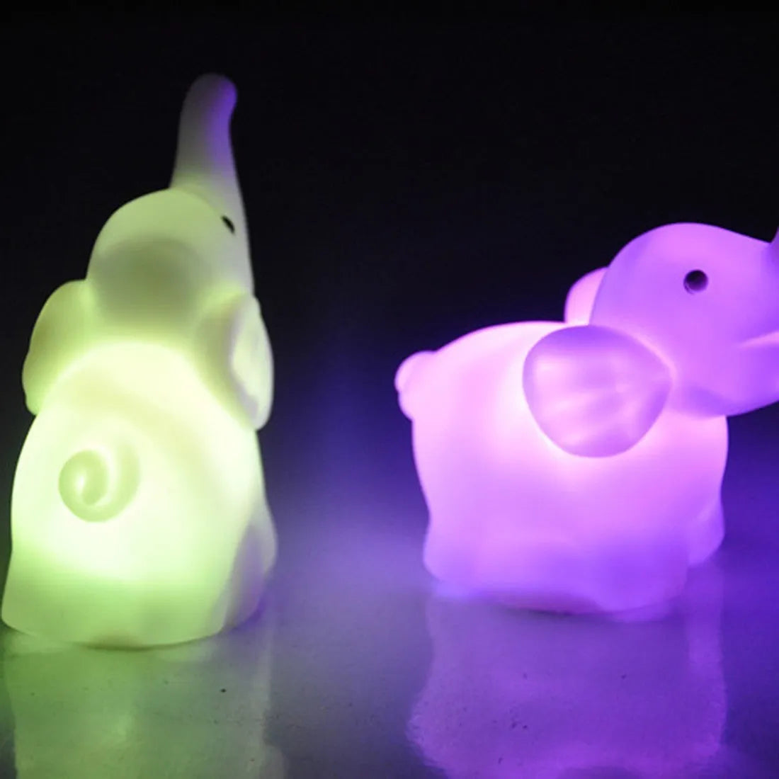 Elephant night light showing 7 colour changing modes with slow flash, vinyl body, 8x8.8x4.5cm size, battery powered